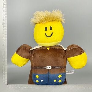 Cheerful Plush Toy with Yellow Face and Brown Outfit